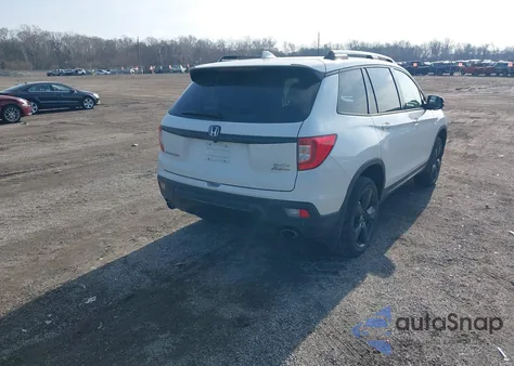 2019 Honda Passport Elite z USA, uszkodzony, nr VIN 5FNYF8H08KB025592
